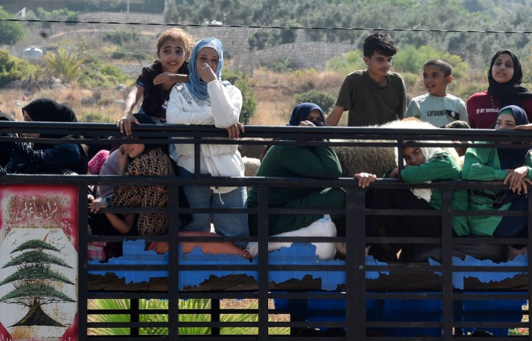 epa11622225 Lebanese people, who are fleeing southern Lebanon, travel with their belongings towards Beirut along the Damour highway, Lebanon, 24 September 2024. Thousands of people fled southern Lebanon after an evacuation warning by the Israeli army, which on 23 September announced that it had launched 'extensive' airstrikes on Hezbollah targets in the country. According to Lebanon's Ministry of Health, at least 558 people have been killed and more than 1,835 have been injured following continued airstrikes on southern Lebanese towns and villages. EPA-EFE/WAEL HAMZEH