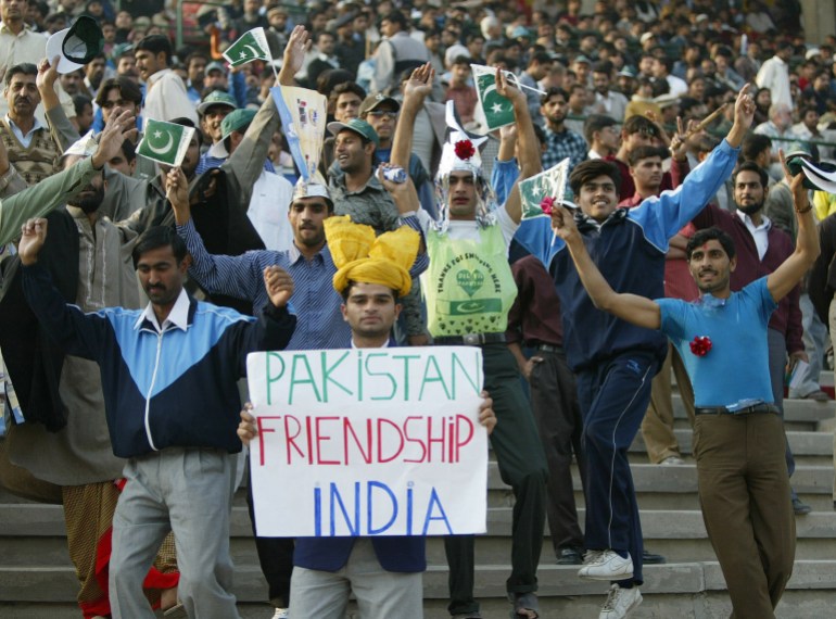 Pakistani crowd celebrate their team's victory over India during 26th Champions Trophy Hockey Tournament in Lahore. Pakistani crowd celebrate their team's victory over India at the 26th Champions Trophy Hockey Tournament in Lahore December 8, 2004. Pakistan beat India by 2-1. REUTERS/Mohsin Raza