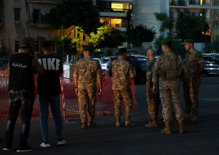 Lebanese army members prepare to carry out a controlled explosion of a walkie-talkie device outside the American University of Beirut Medical Center, in Beirut, Lebanon September 18, 2024. REUTERS/Mohamed Azakir