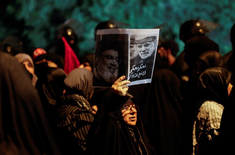 People protest following the announcement of the death of Lebanon's Hezbollah leader Sayyed Hassan Nasrallah, in Baghdad, Iraq, September 28