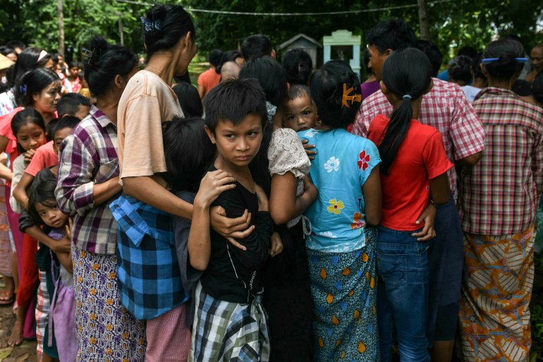 People queuing for food at a relief cenfre in Myanmar's Bago region.