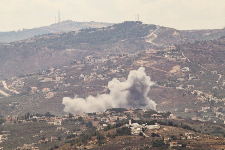 Smoke billows from the site of an Israeli airstrike on Lebanon's southern village of Kfar Kila