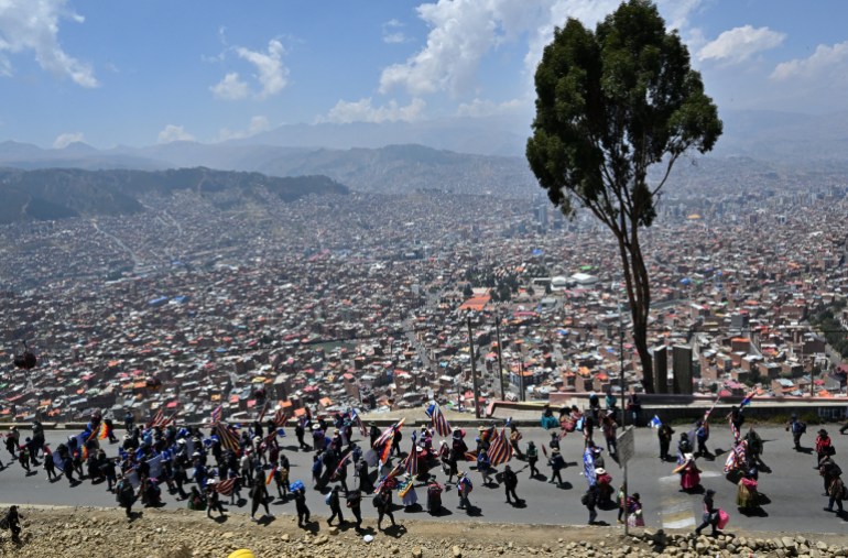 Supporters of former Bolivian President Evo Morales march to La Paz during a rally against President Luis Arce in El Alto, Bolivia, on September 23, 2024. (Photo by AIZAR RALDES / AFP)