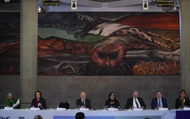 Mexico's Supreme Court Chief Justice Norma Piña, center, attends the commemoration of Judge Day with fellow judges at the Supreme Court in Mexico City