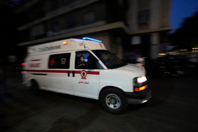 An ambulance carrying wounded people whose handheld pager exploded, arrive at the American University hospital in Beirut, Lebanon, Tuesday, Sept. 17, 2024.