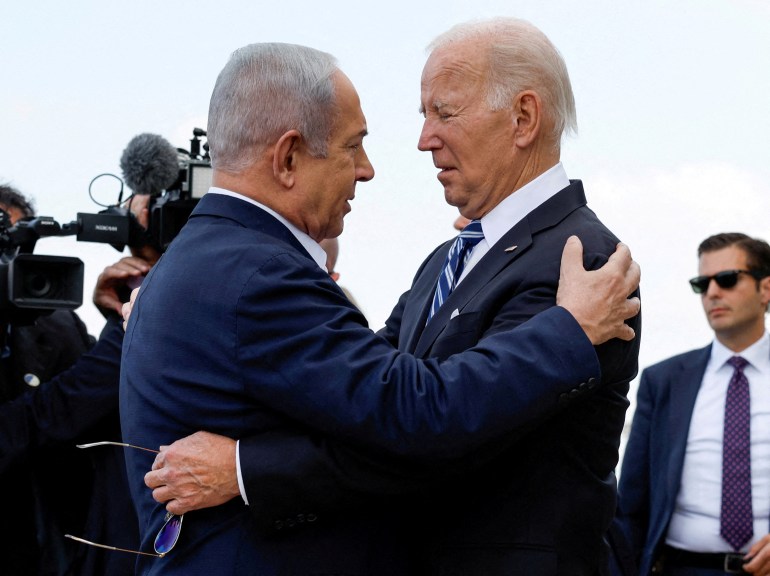 FILE PHOTO: U.S. President Joe Biden is welcomed by Israeli Prime Minster Benjamin Netanyahu, as he visits Israel amid the ongoing conflict between Israel and Hamas, in Tel Aviv, Israel, October 18, 2023. REUTERS/Evelyn Hockstein//File Photo