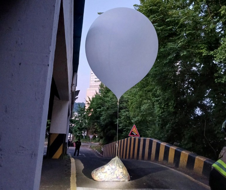 A balloon believed to have been sent by North Korea, carrying various objects including what appeared to be trash, is pictured in Incheon,