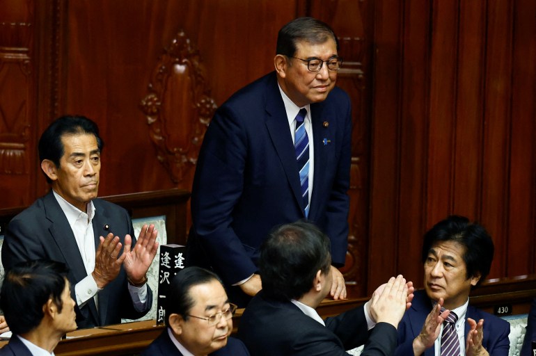 Japan's newly-elected Prime Minister Shigeru Ishiba is applauded after being chosen as the new prime minister, at the Lower House of Parliament in Tokyo, Japan October 1, 2024