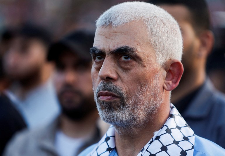 Hamas leader Yahya Sinwar looks on as Palestinian Hamas supporters take part in an anti-Israel rally over tension in Jerusalem's Al-Aqsa mosque, in Gaza City October 1, 2022