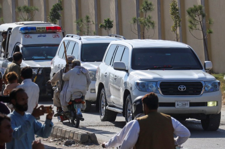 A convoy of vehicles carrying Bushra Bibi, the wife of former Pakistani prime minister Imran Khan, moves after her release from Adiala jail in Rawalpindi, Pakistan, October 24, 2024. REUTERS/STRINGER