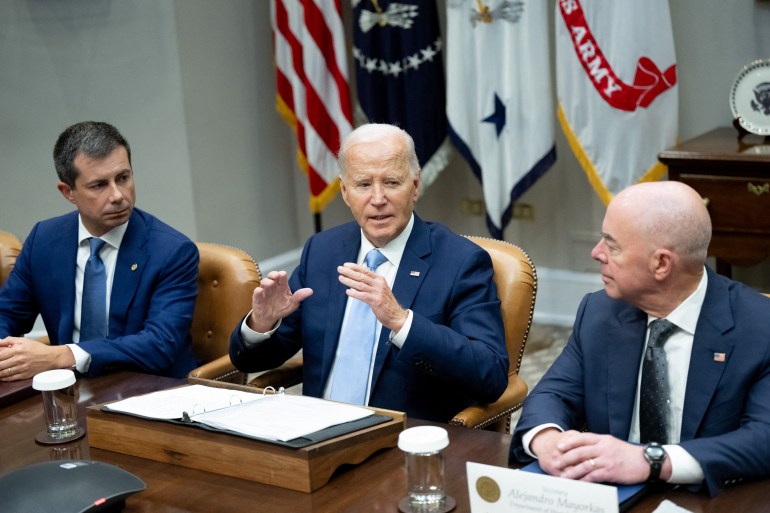 US President Joe Biden speaks alongside Transportation Secretary Pete Buttigieg (L) and Homeland Security Secretary Alejandro Mayorkas (R) during a briefing on Hurricane Helene response and recovery efforts, in the Roosevelt Room of the White House on October 1, 2024 in Washington, DC. (Photo by SAUL LOEB / AFP)