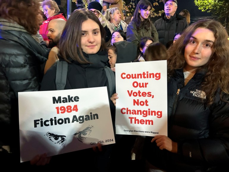 Demonstrators attend an opposition protest against the results of the parliamentary election in Tbilisi,