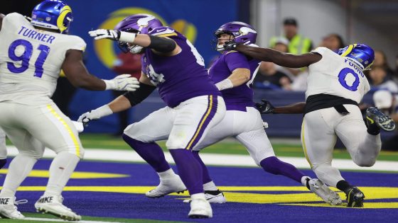 Vikings-Rams ends on missed face mask penalty; officials say they didn't see Byron Young sack Sam Darnold