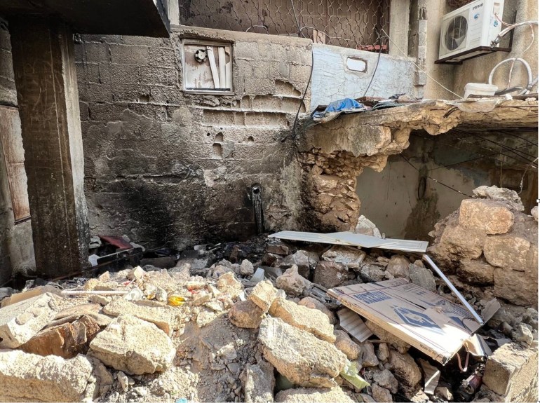 Rubble from a completely destroyed room in the family's house