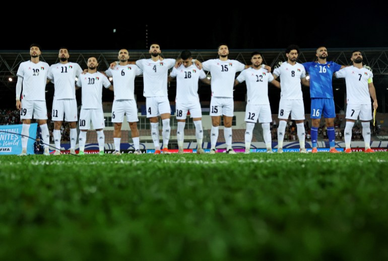 Soccer Football - World Cup - AFC Qualifiers - Group B - Palestine v Jordan - Kuala Lumpur Football Stadium, Kuala Lumpur, Malaysia - September 10, 2024 Palestine players line up during the national anthems before the match REUTERS/Hasnoor Hussain