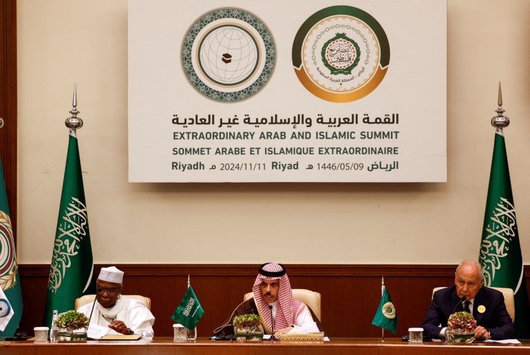 Saudi Foreign Minister Prince Faisal bin Farhan Al-Saud, Secretary General of the Organisation of Islamic Cooperation Hissein Brahim Taha, and Arab League Secretary-General Ahmed Aboul Gheit attend a press conference, following the Arab-Islamic extraordinary summit held to investigate Israel's conflict with Hamas in Gaza and Hezbollah in Lebanon, in Riyadh, Saudi Arabia,