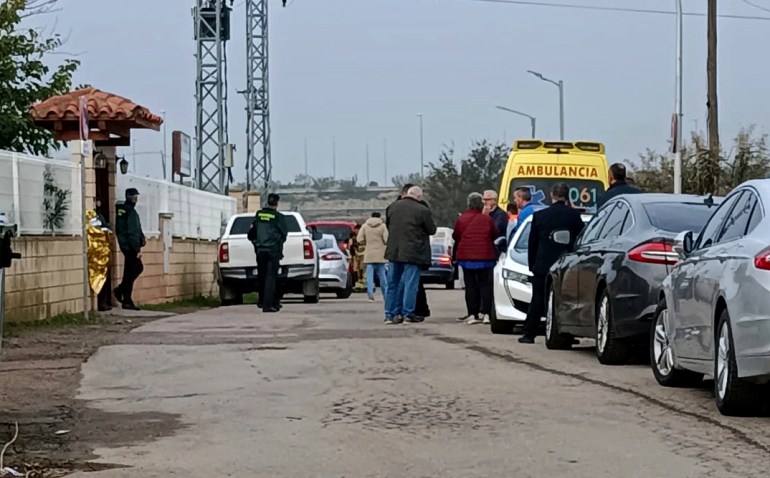 Relatives waiting for news outside the nursing home where least 10 people have died in a fire in Zaragoza, Spain