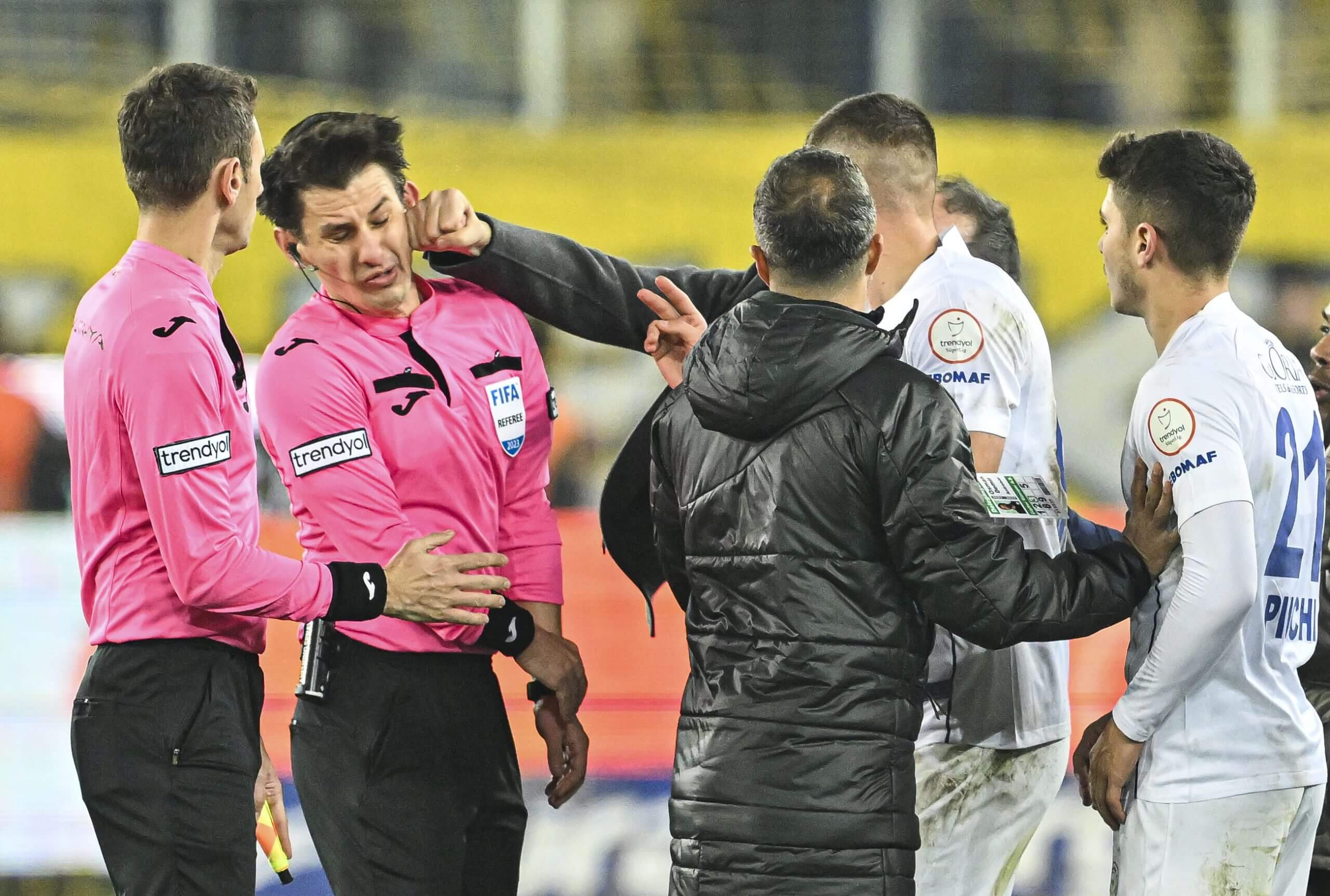 Koca stormed the pitch to punch Meler in the face after full-time (Emin Sansar/Anadolu via Getty Images)