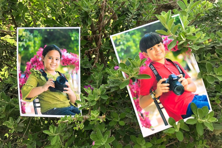 photos of two children holding a camera placed in the branches of a tree