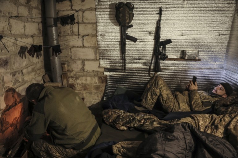 epa11774868 A handout photo made available by the press service of the 24th Mechanized Brigade of the Ukrainian Armed Forces shows servicemen of the artillery unit of 24th Mechanized Brigade resting in a shelter close to their position near Chasiv Yar, Donetsk region, Ukraine, 12 December 2024, (issued 13 December 2024). EPA-EFE/24th Mechanized Brigade HANDOUT HANDOUT EDITORIAL USE ONLY/NO SALES