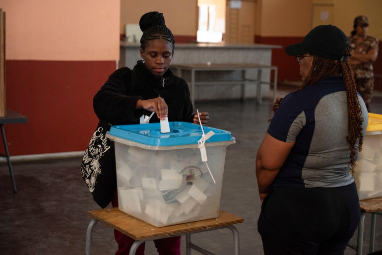 A woman casts her vote in Namibia