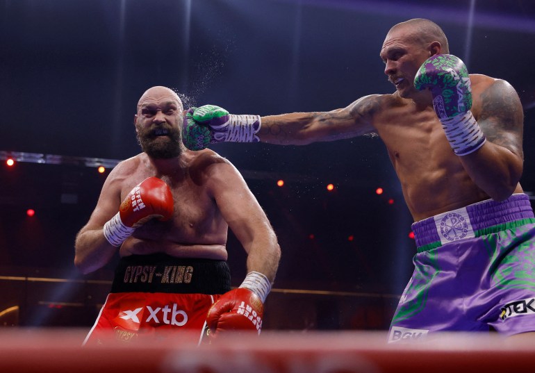 Boxing - Oleksandr Usyk v Tyson Fury - Heavyweight World Title - Kingdom Arena, Riyadh, Saudi Arabia - December 22, 2024 Tyson Fury in action against Oleksandr Usyk Action Images via Reuters/Andrew Couldridge