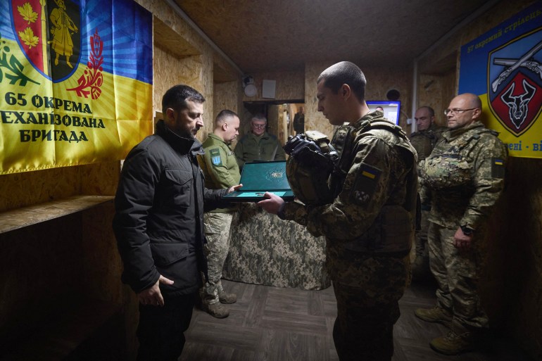 This handout photograph taken and released by Ukrainian Presidential Press Service on December 12