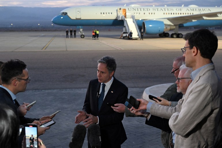 U.S. Secretary of State Antony Blinken speaks to reporters on the tarmac before his departure from King Hussein International Airport in Jordan's southern Red Sea coastal city of Aqaba on December 12, 2024. Andrew Caballero-Reynolds/Pool via REUTERS