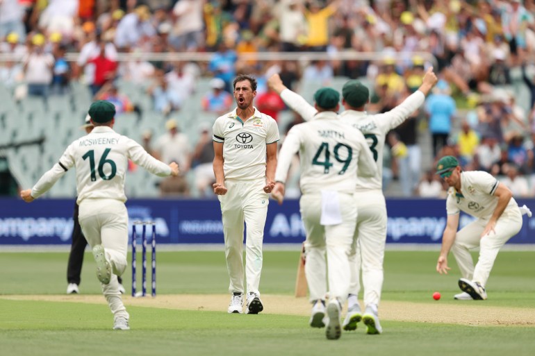 ADELAIDE, AUSTRALIA - DECEMBER 06: Mitchell Starc of Australia celebrates after dismissing Yashasvi Jaiswal of India LBW during day one of the Men's Test Match series between Australia and India at Adelaide Oval on December 06, 2024 in Adelaide, Australia. (Photo by Robert Cianflone/Getty Images)