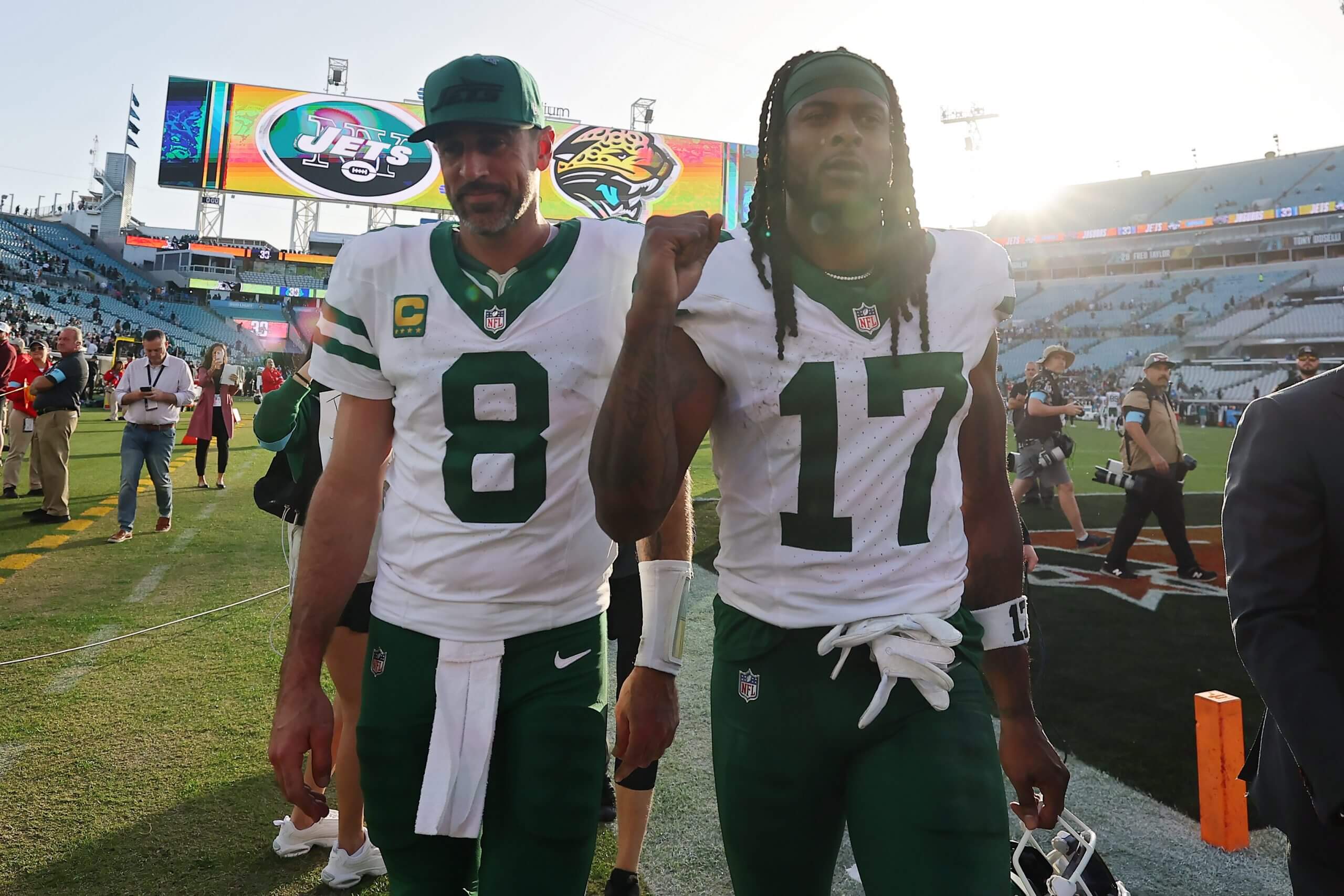 Aaron Rodgers and Davante Adams of the New York Jets walk off the field after the game against the Jacksonville Jaguars at EverBank Stadium on December 15, 2024 in Jacksonville, Florida. The Jets defeated the Jaguars 32-25.